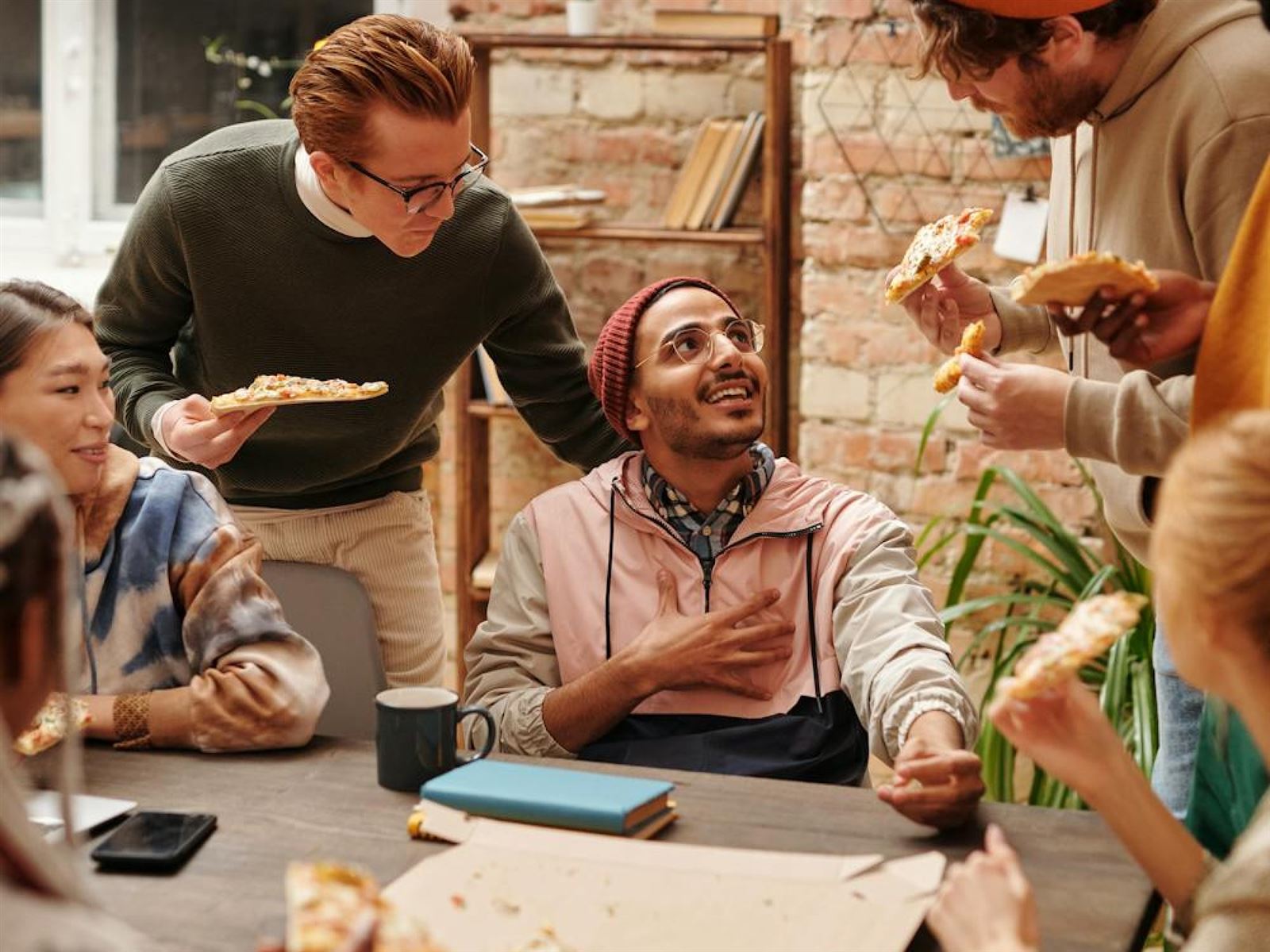 The marketing team collaborating around a table