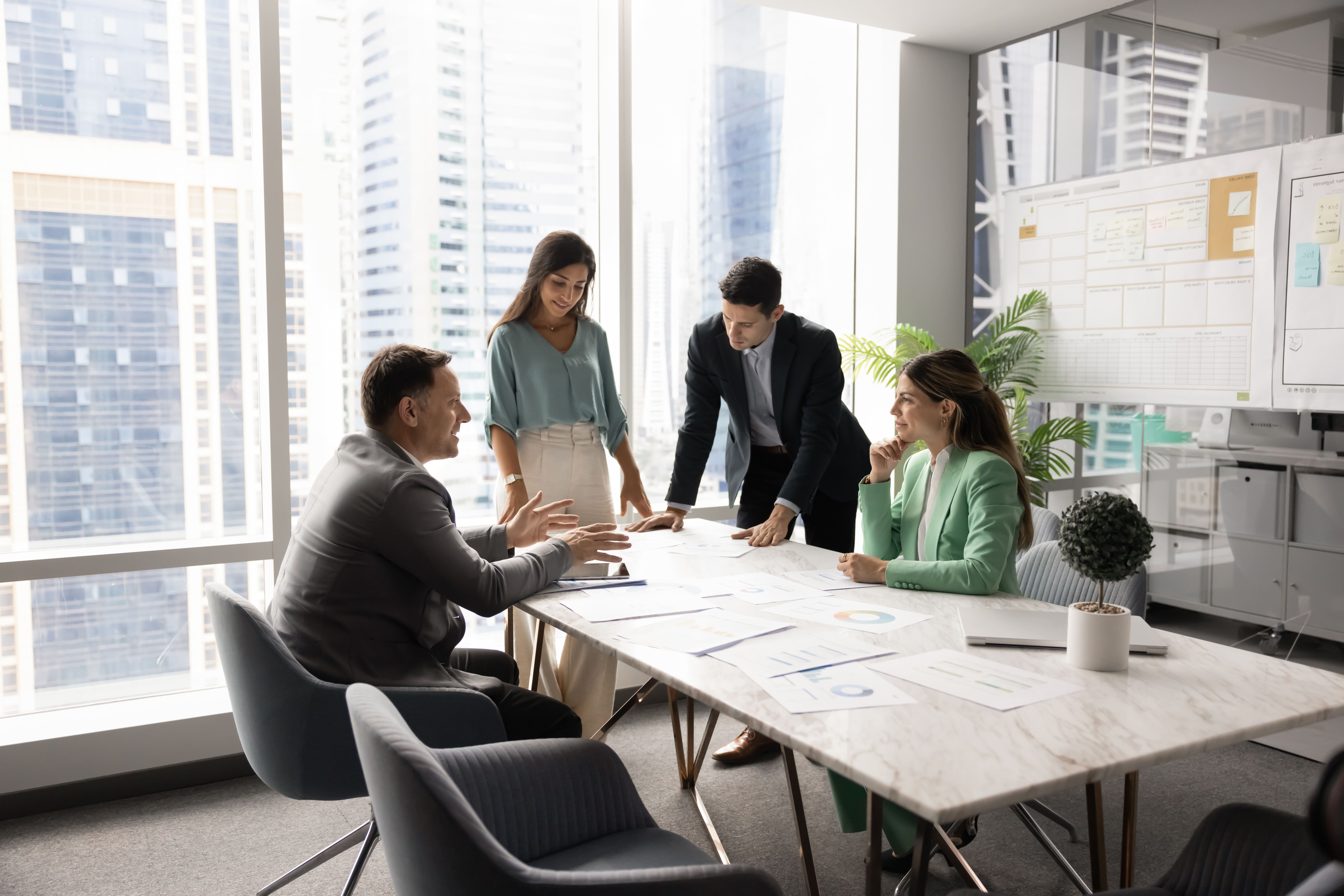 A team mapping marketing plans for clinics at different growth stages