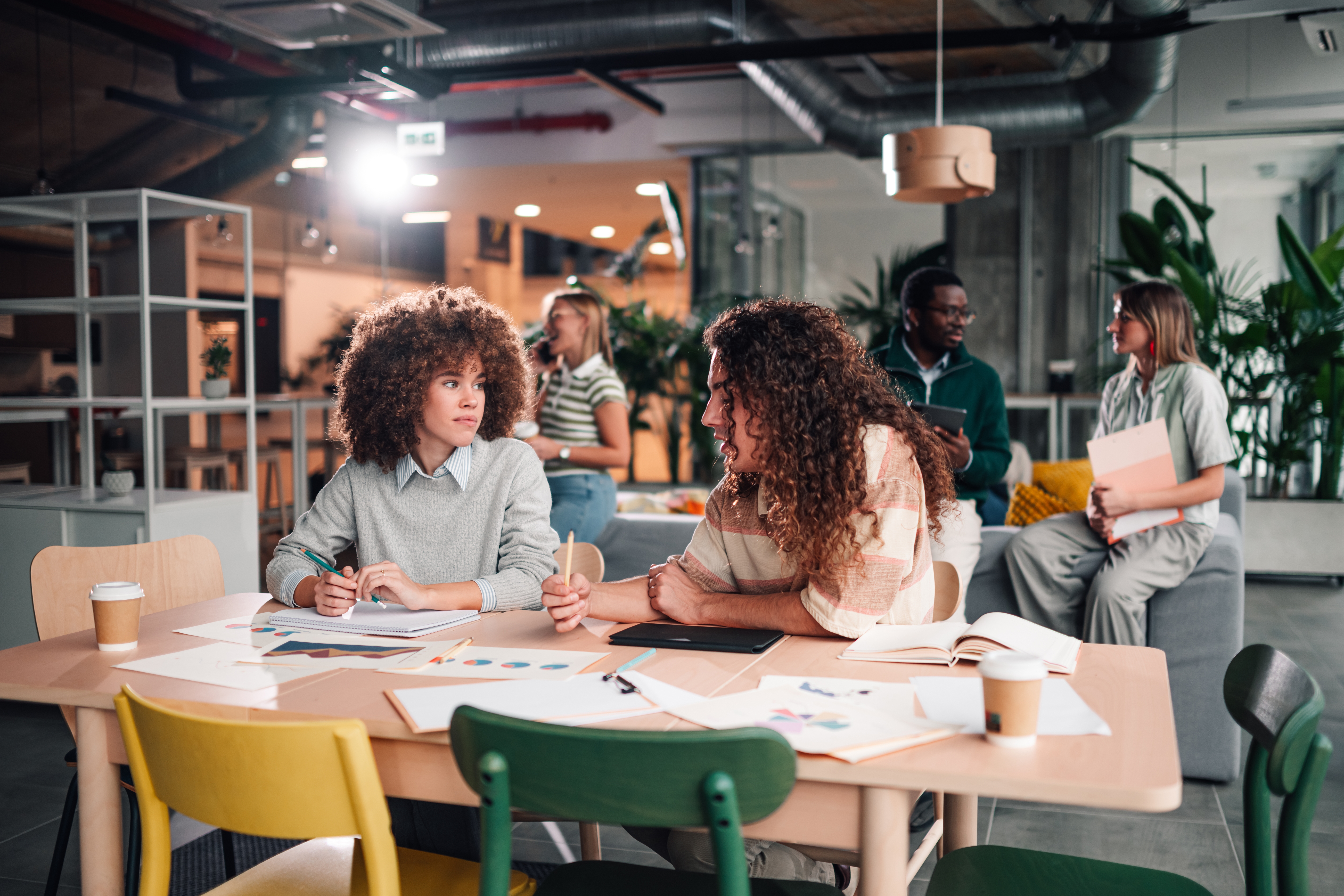 The Toronto-based marketing team collaborating in the office