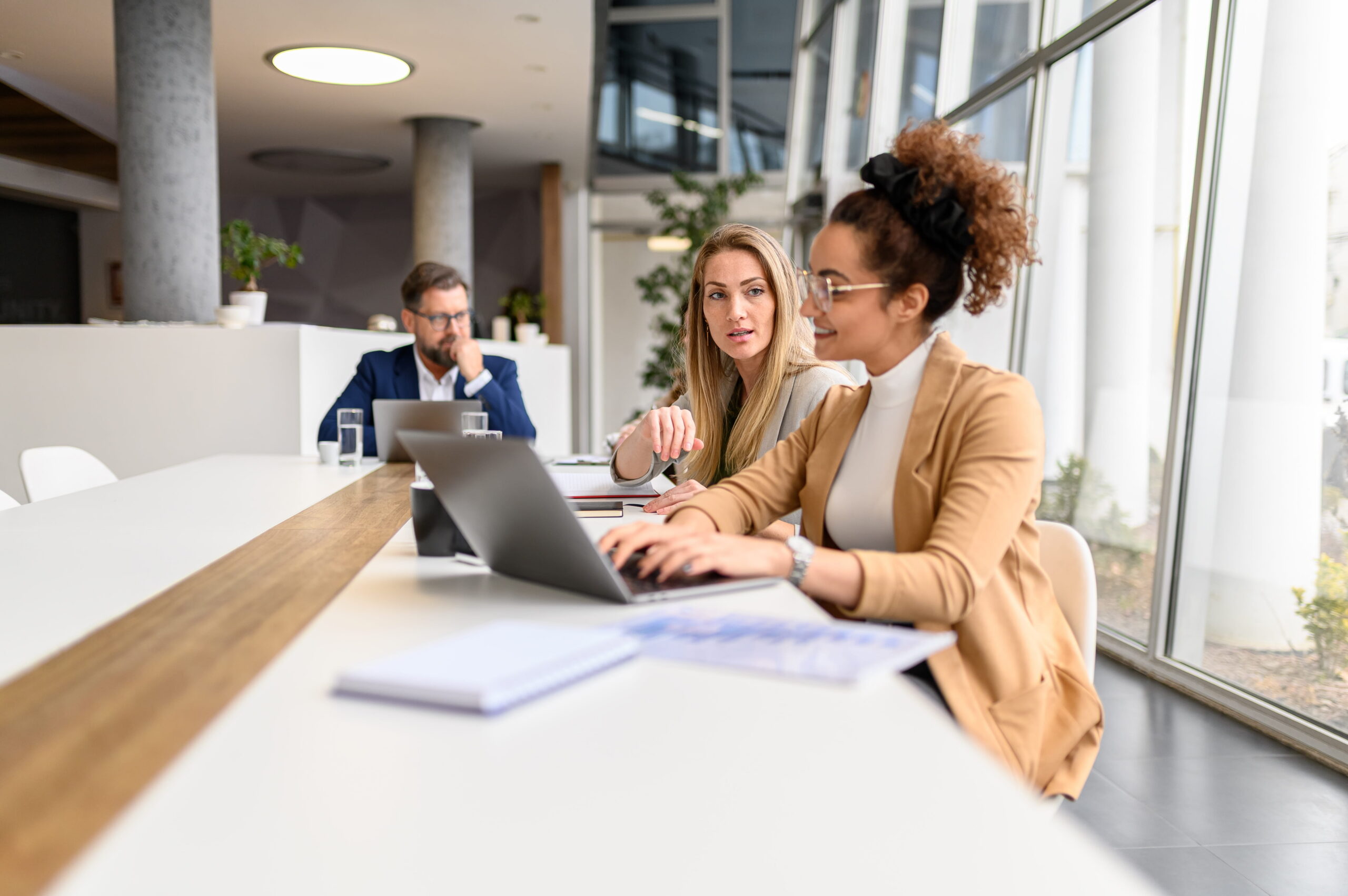 Reviewing content performance metrics on a laptop